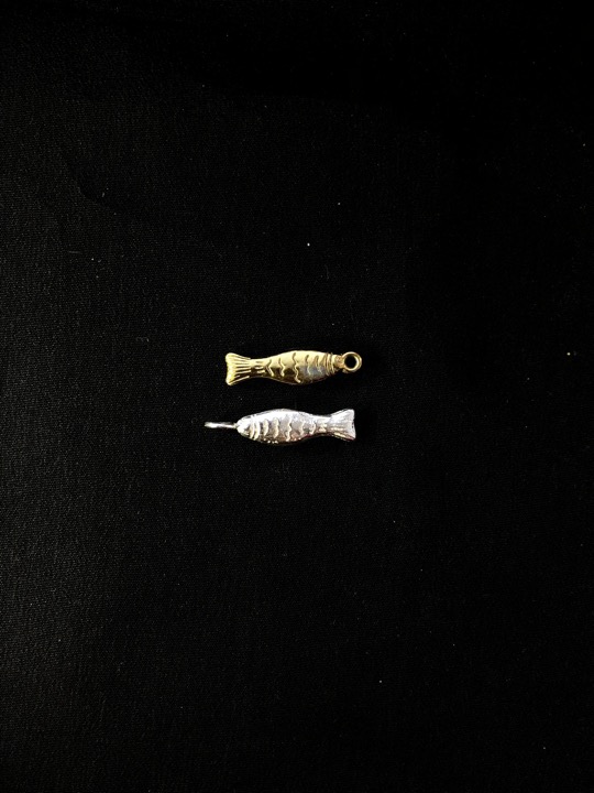 Silver fish charm
